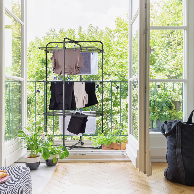 Leifheit Classic 270 Tower Laundry Dryer - Black on the balcony
