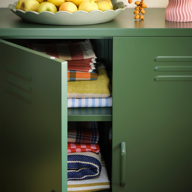 Popstrukt Sugar Cube Storage Cabinet - Dark Olive detail with towels and throws