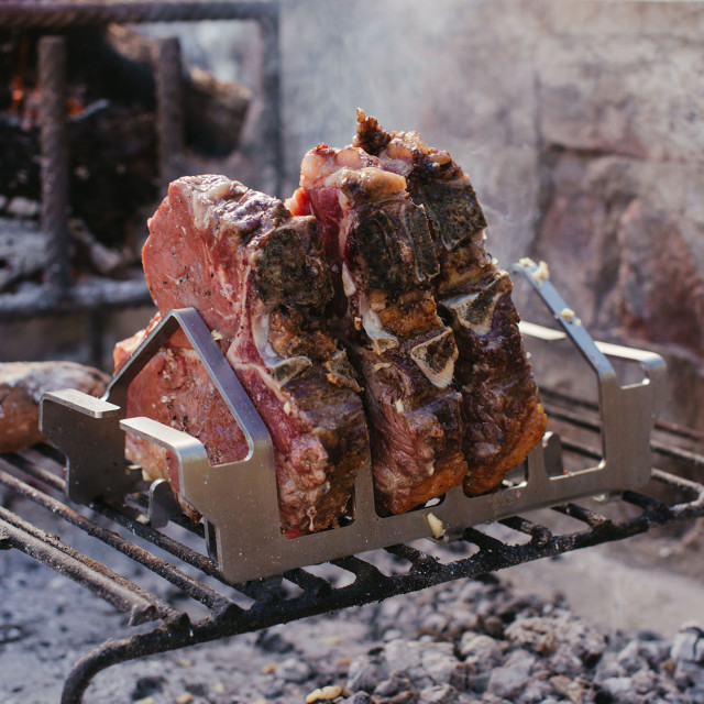 Lifestyle image of Dreem Fire Pro 4 Slot T-Bone Braai Rack
