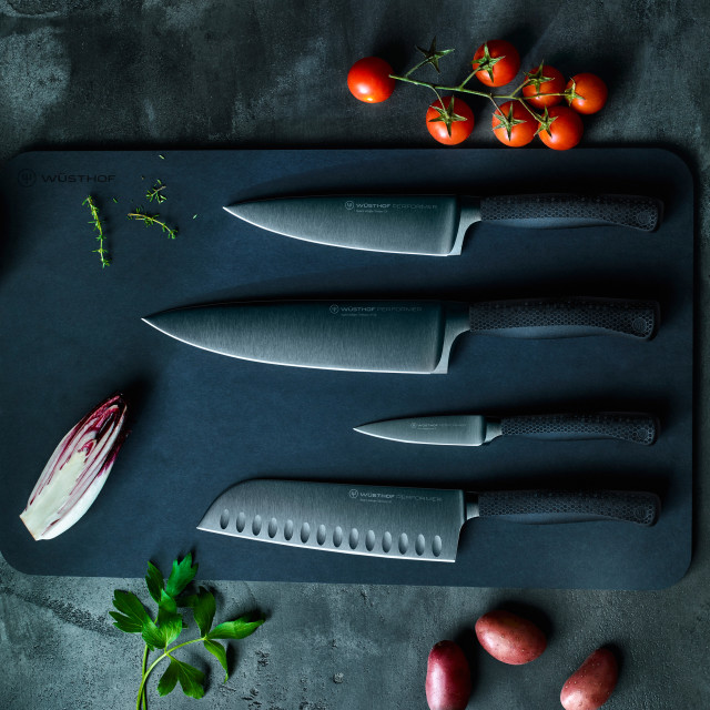 Performer range on a chopping board with vegetables. Additional knives sold separately.
