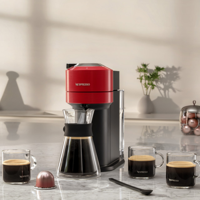 Nespresso Nespresso Vertuo Next Automatic Espresso Machine - Cherry Red in use. Coffee jug not included
