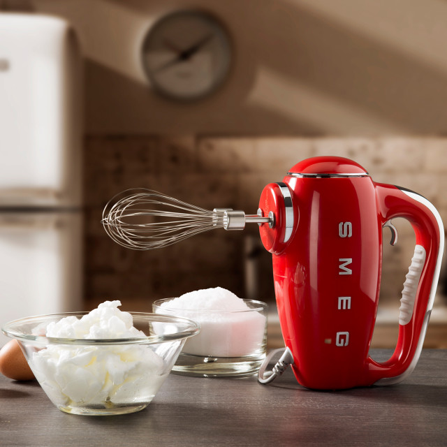Smeg Retro Style Hand Mixer - Fiery red in use
