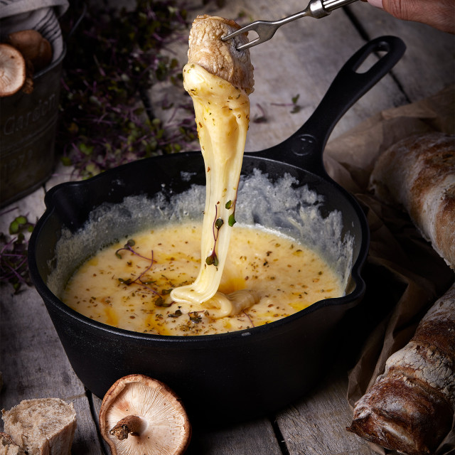 Victoria Matte Black Enamelled Cast Iron Saucepan - 1.9L in use
