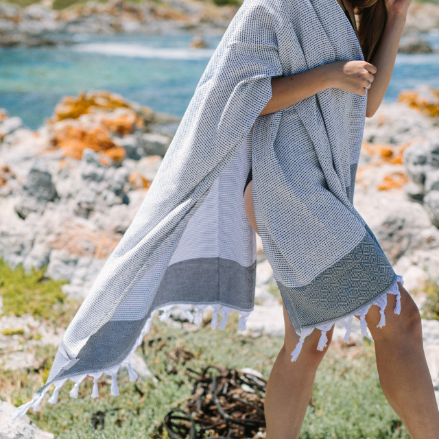 The Cotton Company Dimanta Stripe Turkish Towel - Dark Grey in use