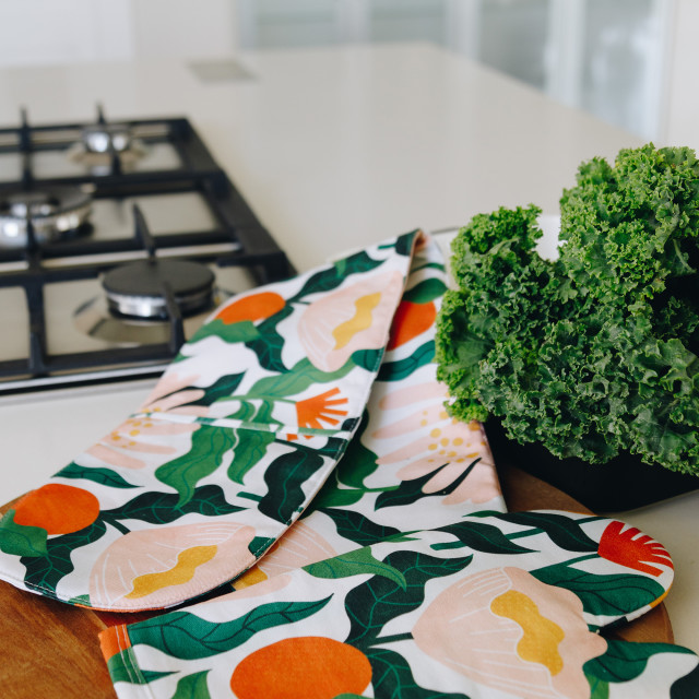 Aurora Home Cotton Fynbos Printed Double Oven Mitt in use