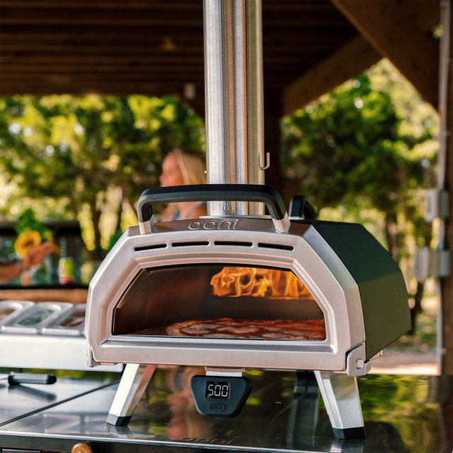 Ooni Ooni Karu Wood & Charcoal Fired Pizza Oven, 40cm in use