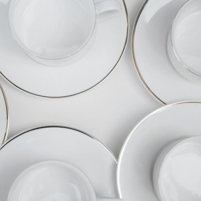 Jan Gold Band Tea Cup & Saucer, Set of 4 in use