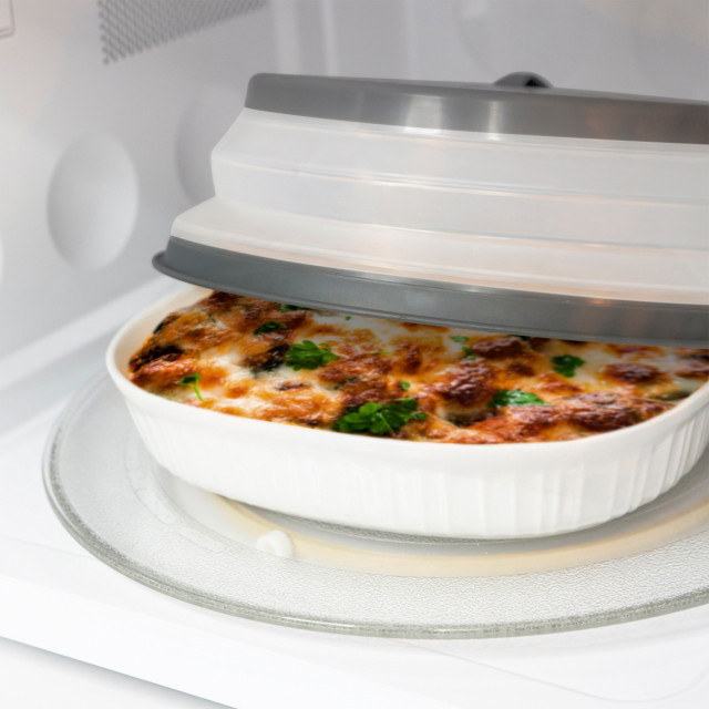 Tovolo Collapsible Microwave Food Cover & Colander - Large in use
