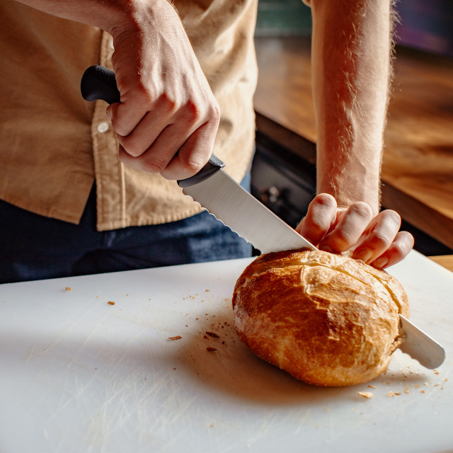Mercer Culinary Millennia Wavy Edge Wide Bread Knife, 25cm in use