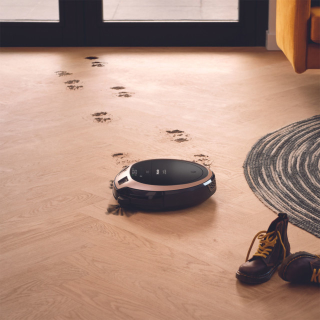 Miele RX3 Scout Robot Vacuum Cleaner in use