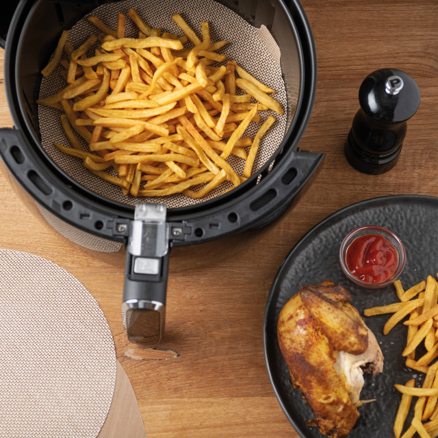 NoStik Reusable Air Fryer Liners, Set of 2 in use