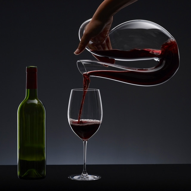 Riedel Ayam Decanter pouring wine in a glass