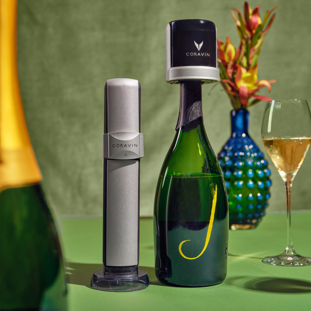 Coravin Sparkling Wine Preservation System next to the sparkling wine bottle