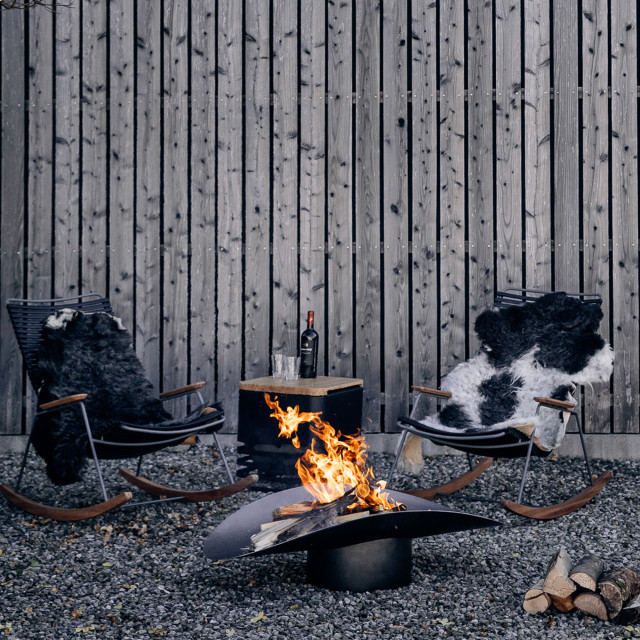 Hoefats Ellipse Firebowl at an outdoor cosy seating