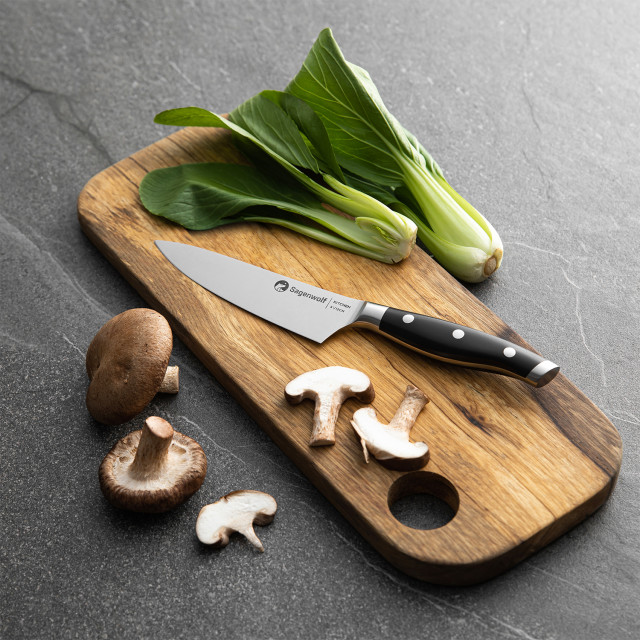 Sagenwolf Performance Kitchen Knife, 12cm on a wooden board with Sliced mushrooms and bok choy