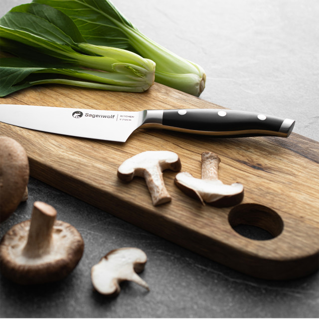 Sagenwolf Performance Kitchen Knife, 12cm on a wooden board with Sliced mushrooms and bok choy