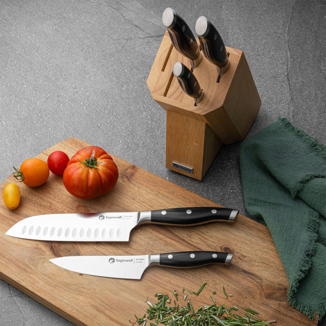 Sagenwolf Performance Santoku Knife, 18cm at a table setting with a chopping board and knife block