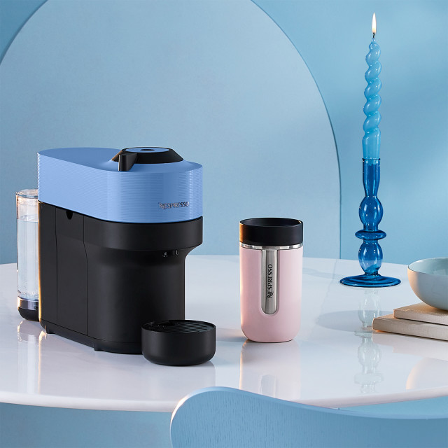 Nespresso Vertuo Pop Coffee Machine - Pacific Blue with a flask