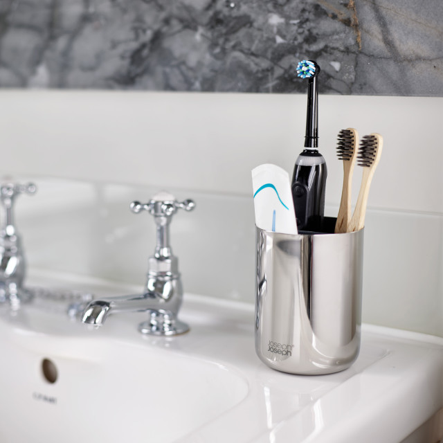Joseph Joseph EasyStore Luxe Toothbrush Caddy on sink with toothbrushes and toothpaste