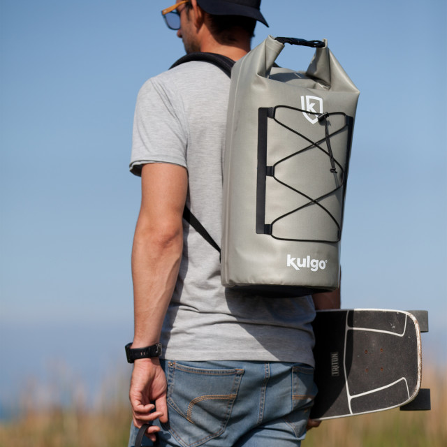 Kulgo Backpack Adventure Cooler, 20L with a skateboard
