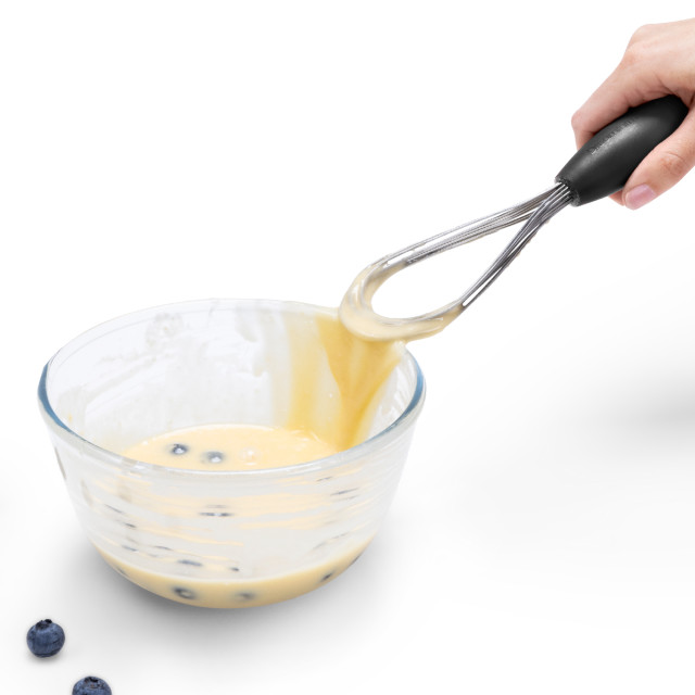 Dreamfarm Mini Flisk Whisk - Black removing whisked condensed milk from the flisk whisk