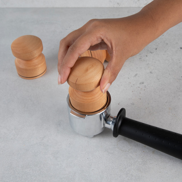 Oh Nice Wooden Coffee Tamper, 51mm - Beech with a portafilter
