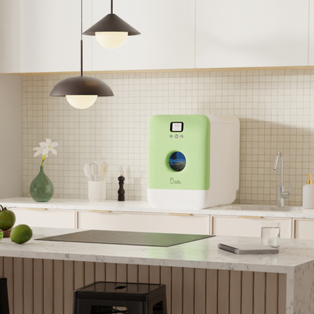 Daan Tech Bob Dishwasher Eco-Compact - Almond Green on the kitchen counter