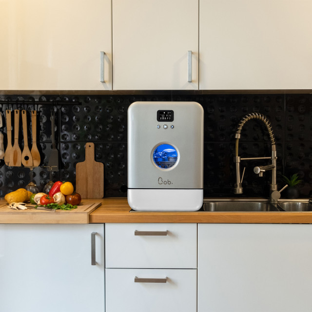Daan Tech Bob Dishwasher Eco-Compact - Grey next to the sink
