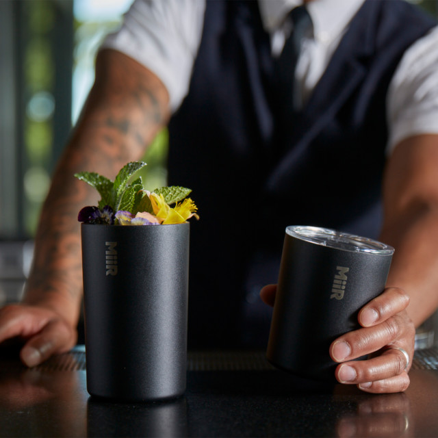 MiiR Vacuum Insulated Highball Tumbler, 410ml - Black on the bar table