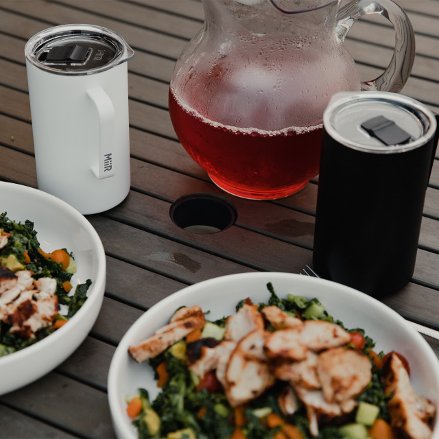 MiiR Vacuum Insulated Camp Cup, 590ml - White on the table with another colour