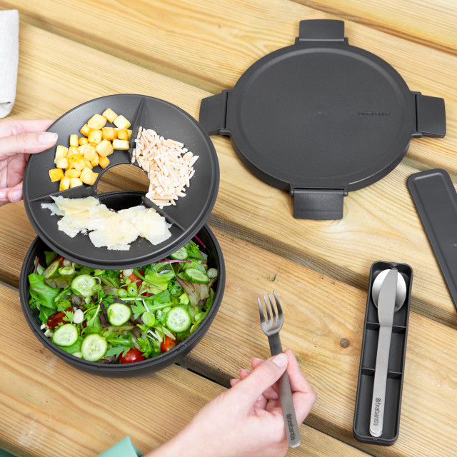 Brabantia Make & Take Salad Bowl, 1.3L - Dark Grey on the table with food