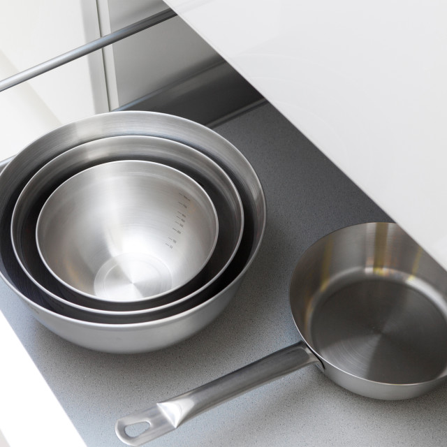 Brabantia Matte Steel Mixing Bowl, Set of 3 in the kitchen drawer with a pan