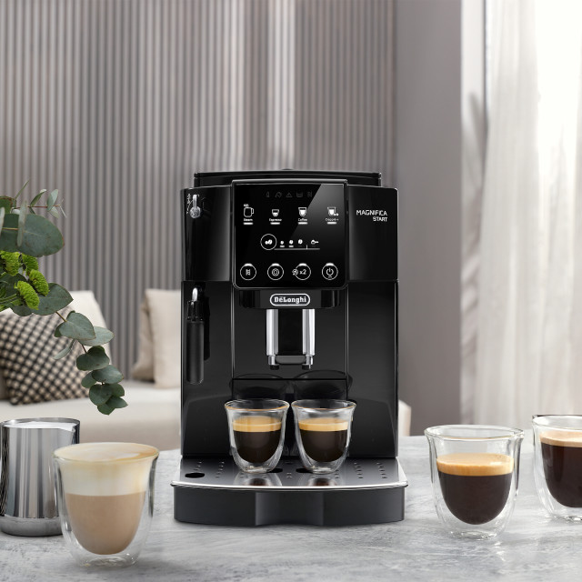 DeLonghi Magnifica Start Bean to Cup Coffee Machine - ECAM220.21.B on a light counter top