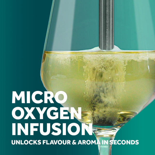 Aerator in use on wine in wine glass