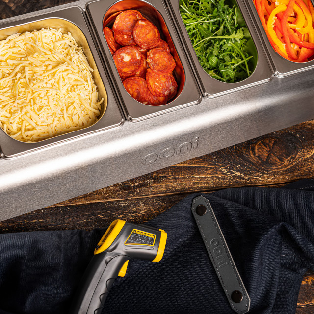 Ooni Pizza Topping Station in use with ooni