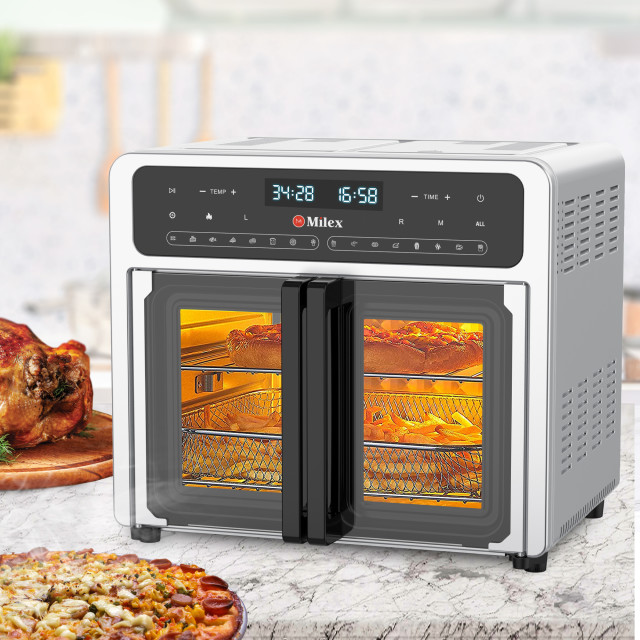Milex Deluxe Rotisserie Airfryer, 24L on the table with food