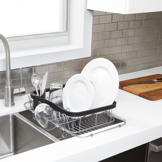 Umbra Sinkin Dish Rack 3-In-1  - Black and Nickel in use next to the sink with dishes