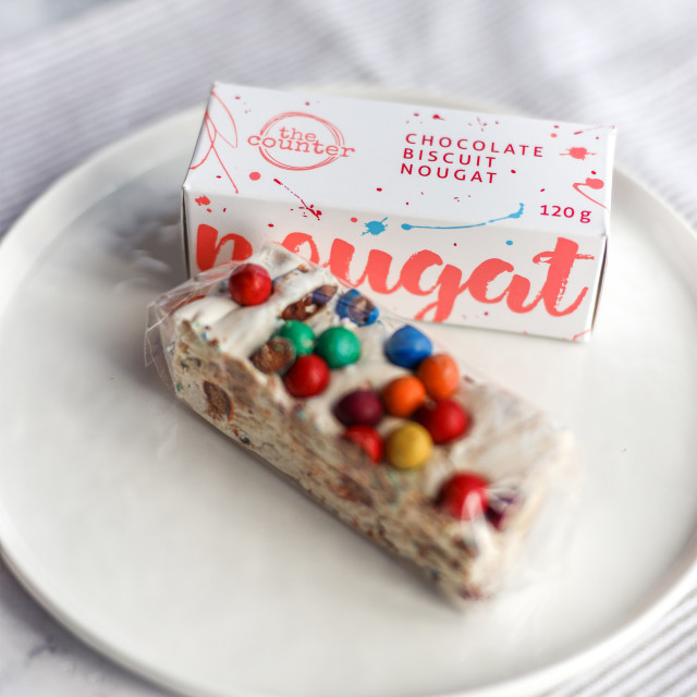 The Counter Chocolate Biscuit Nougat, 120g on the table