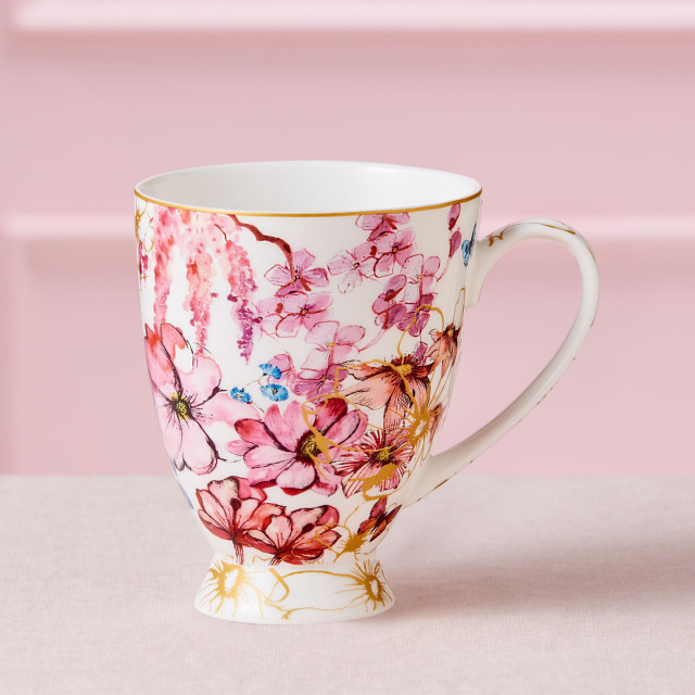 Maxwell & Williams Estelle Michaelides Enchantment Footed Mug, 300ml on the table