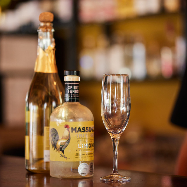 Massimo's Spiriti Famosi Limone Limoncello Liqueur, 500ml on the bar table