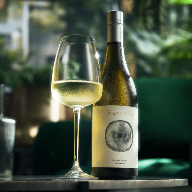 Terre Paisible Franschhoek Sauvignon Blanc, 2022 on the table with a glass