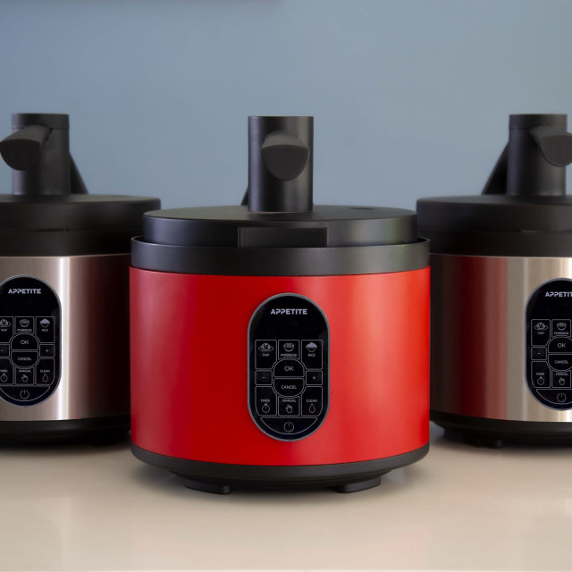 Appetite Automatic Pap Maker Deluxe with Auto Stir - Red and other colours on the table