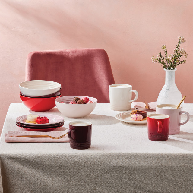 Le Creuset La Collection Petits Fours Cereal Bowls, Set of 4 on the table with mugs