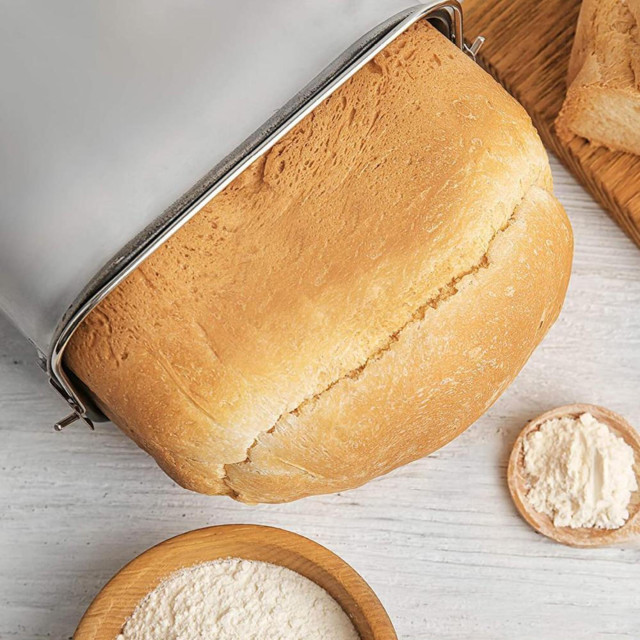 Milex Stainless Steel Bread Maker with bread on the table