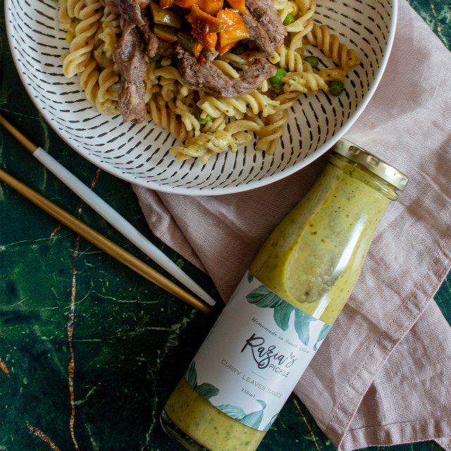 Razias Pickle Medium Spice Curry Leaves Sauce, 250ml with food