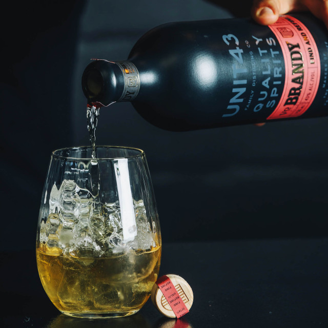 Unit 43 Distilling Company VO Brandy, 750ml being poured
