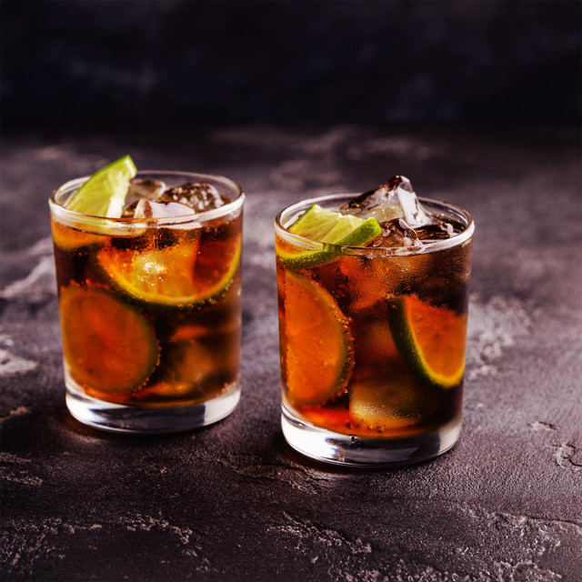 Unit 43 Distilling Company Forty Three Stripes Dark Rum, 750ml poured glasses of Rum