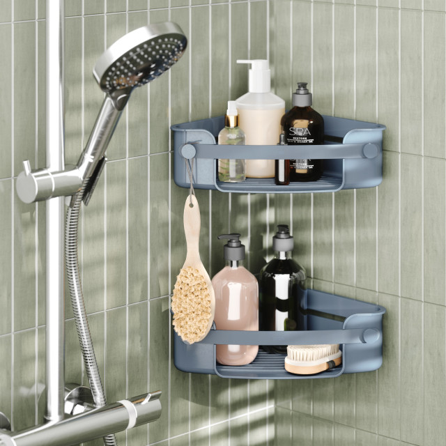 Umbra Flex Adhesive Corner Shower Caddy - Slate Blue on a shower wall with soaps