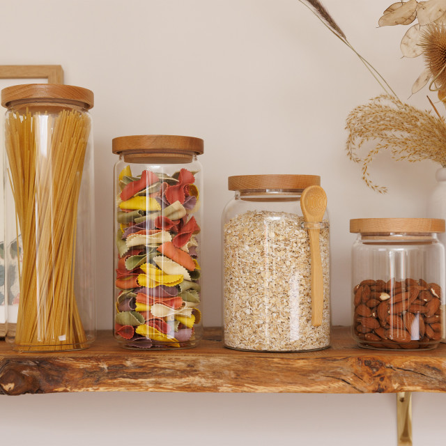 KitchenCraft Idilica Glass Storage Jar with Beechwood Lid - Large on the table