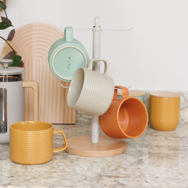 KitchenCraft Idilica Beechwood and Galvanised Steel Mug Tree on the kitchen counter with mugs